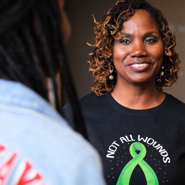 Dr. Shantel Thomas speaks with youth participants at The Center for Healing the Hurt's 2023 Teen Mental Health Day